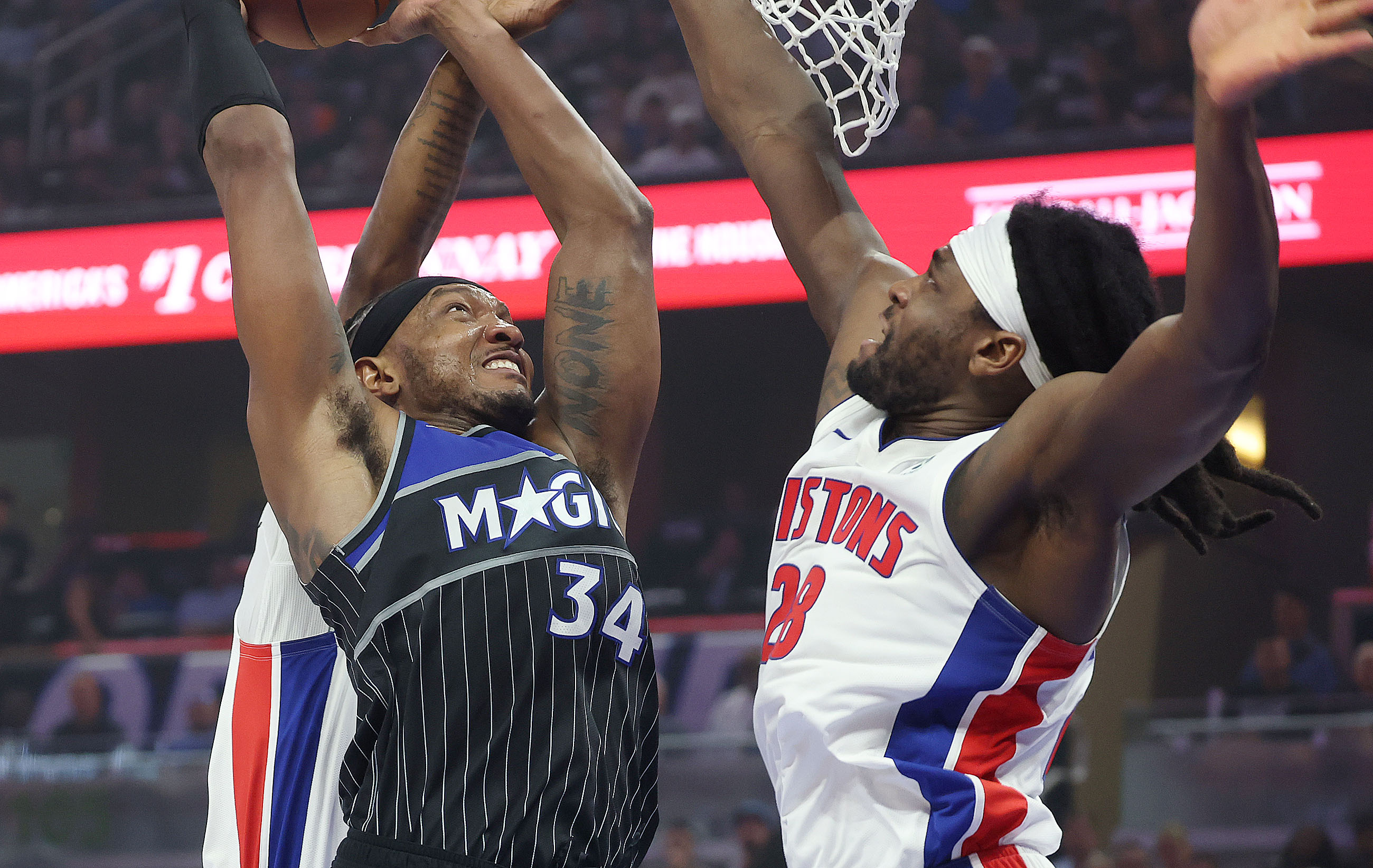 Orlando center Wendell Carter Jr. (34) tries to score past...
