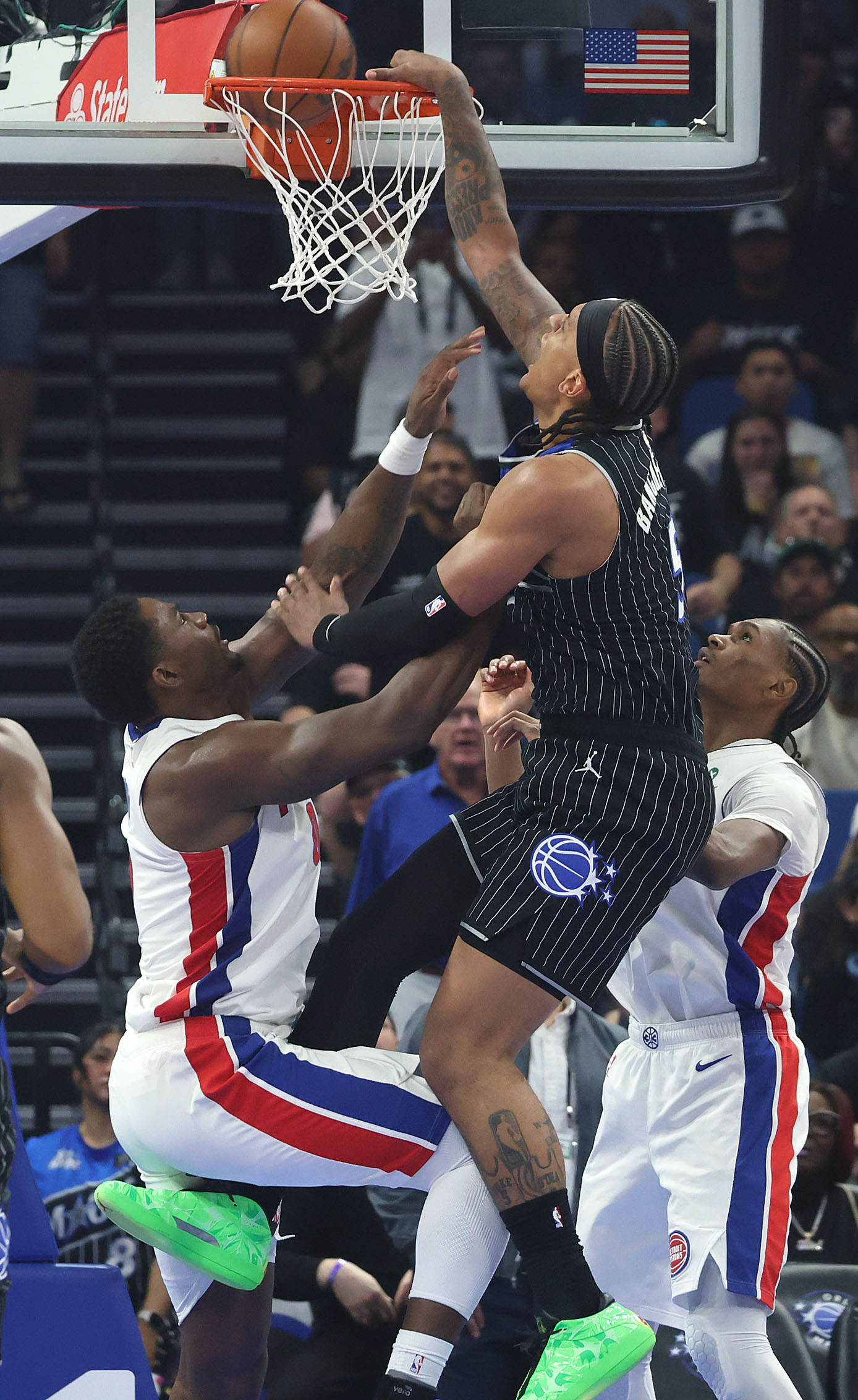 Orlando forward Paolo Banchero slam dunks during the NBA Playoff...