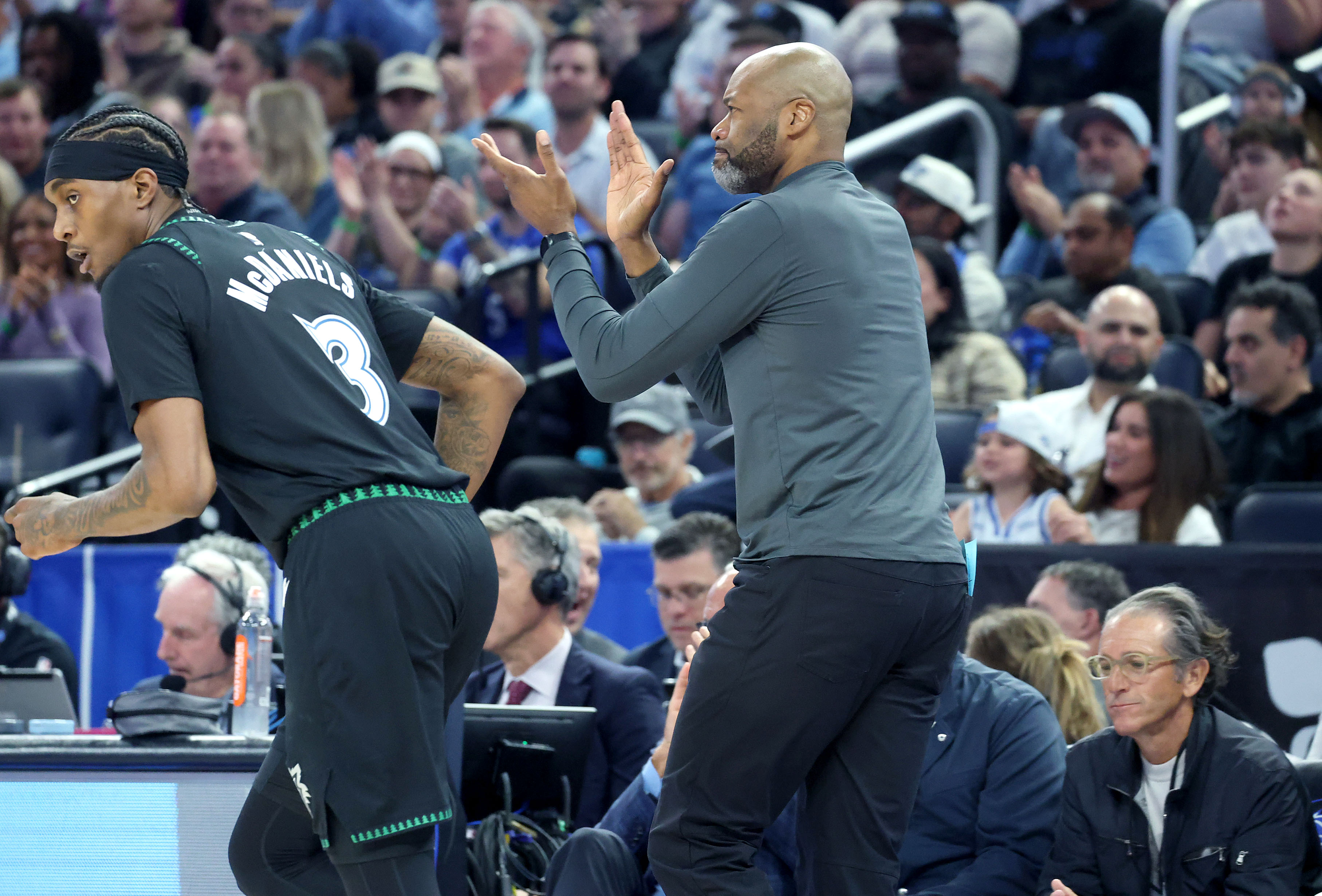 Orlando coach Jamahl Mosley claps during the Minnesota Timberwolves at...
