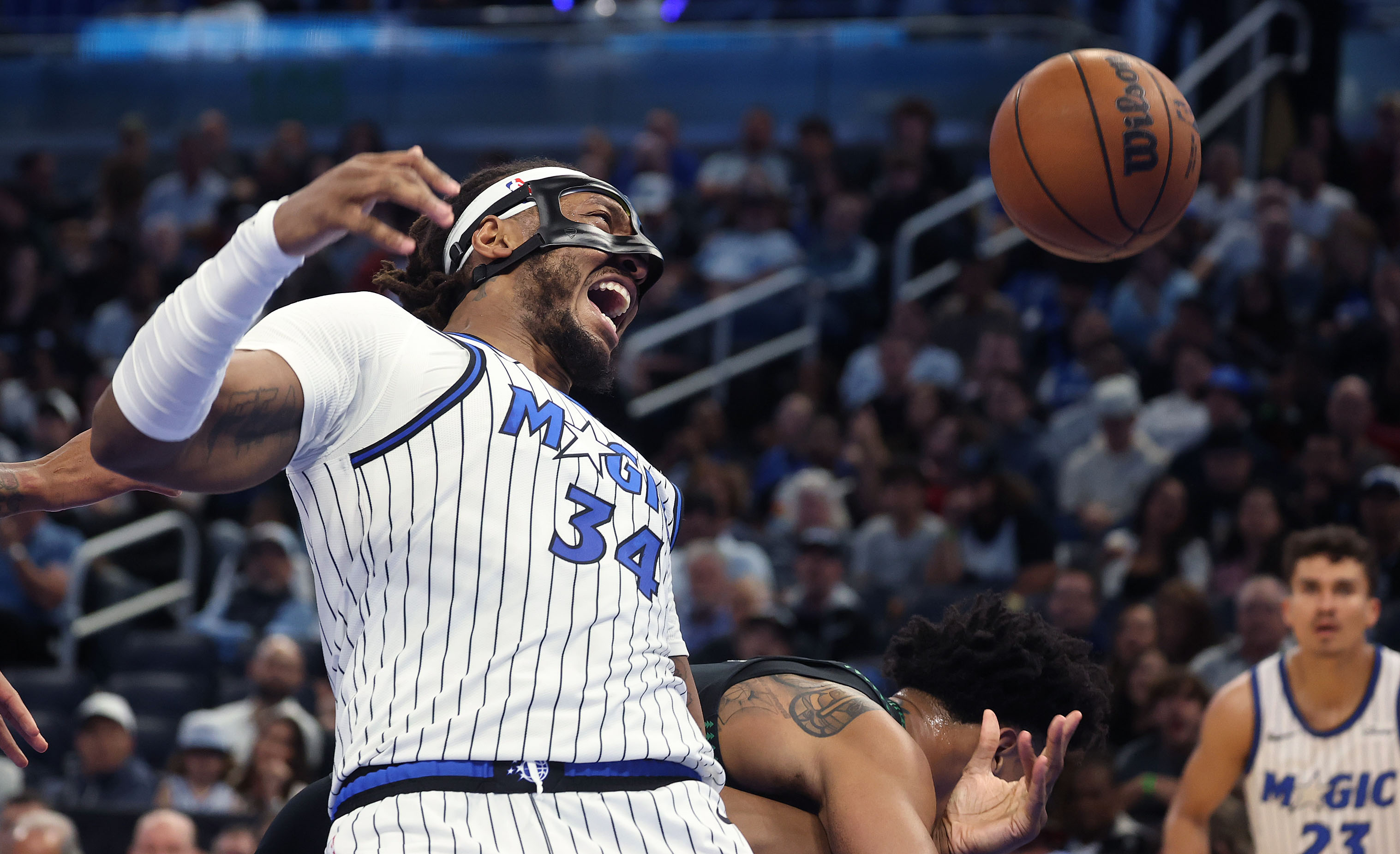 Orlando center Wendell Carter Jr. (34) screams as he is...