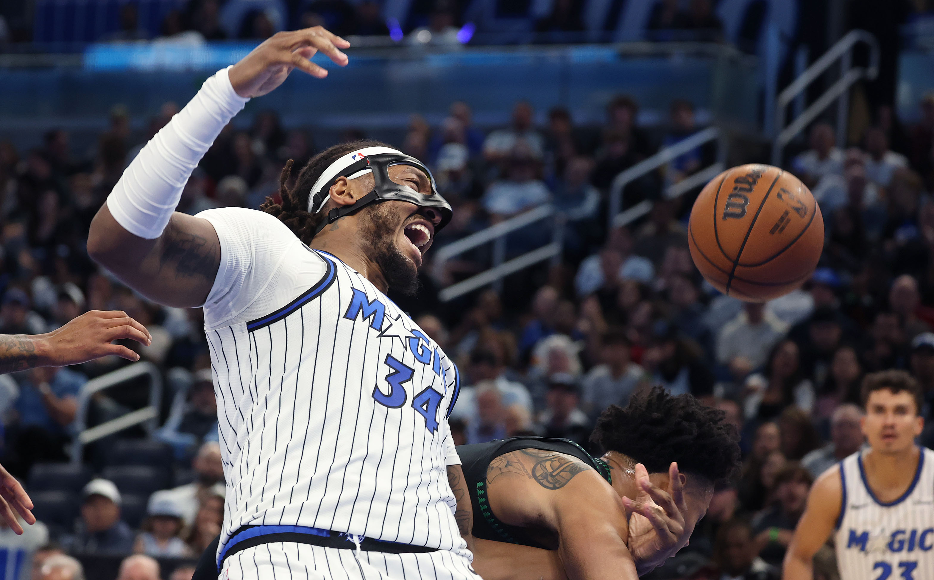 Orlando center Wendell Carter Jr. (34) screams as he is...