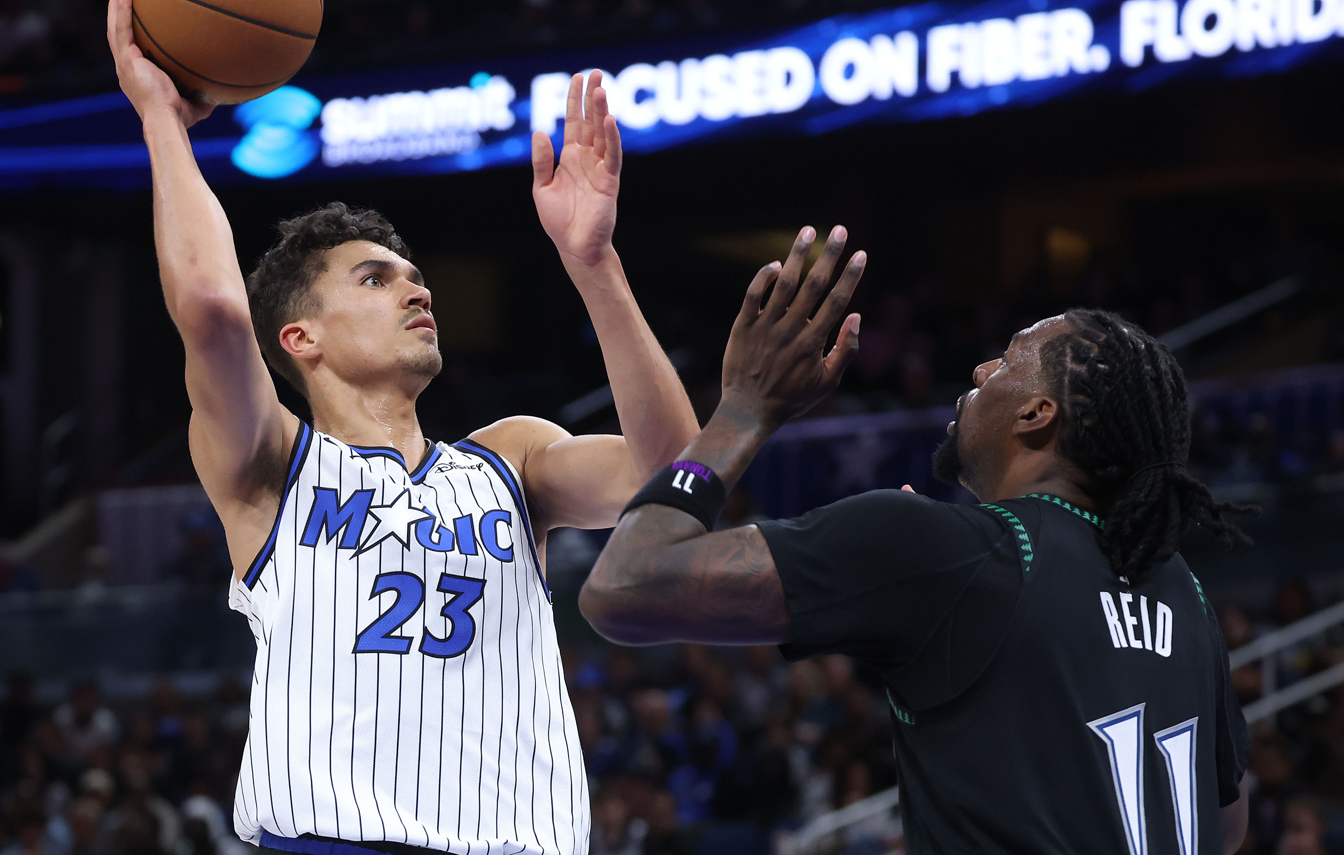 Orlando forward Tristan da Silva (23) looks to shoot past...