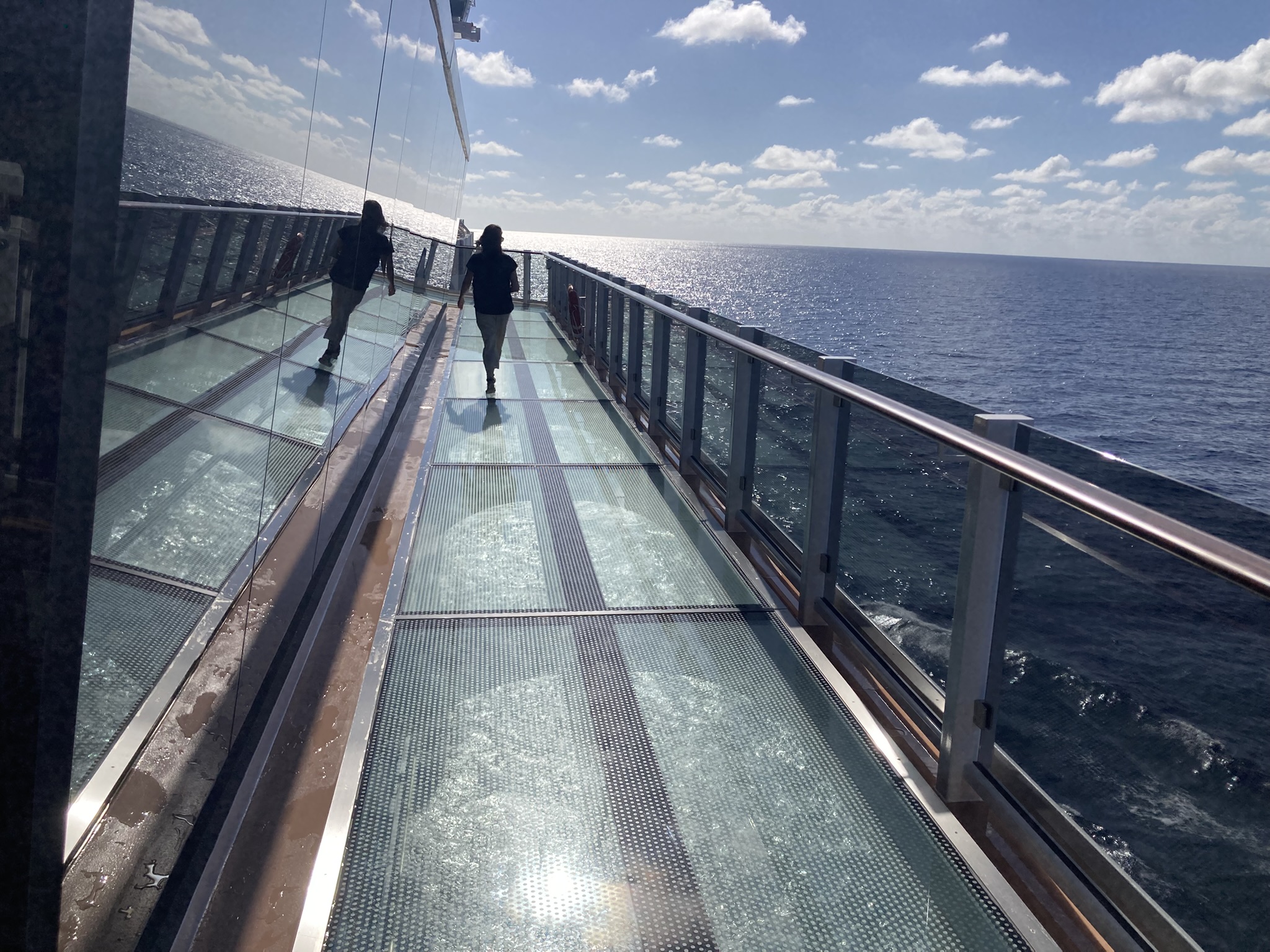 Deck 8 features two see-through glass walkways on board the...
