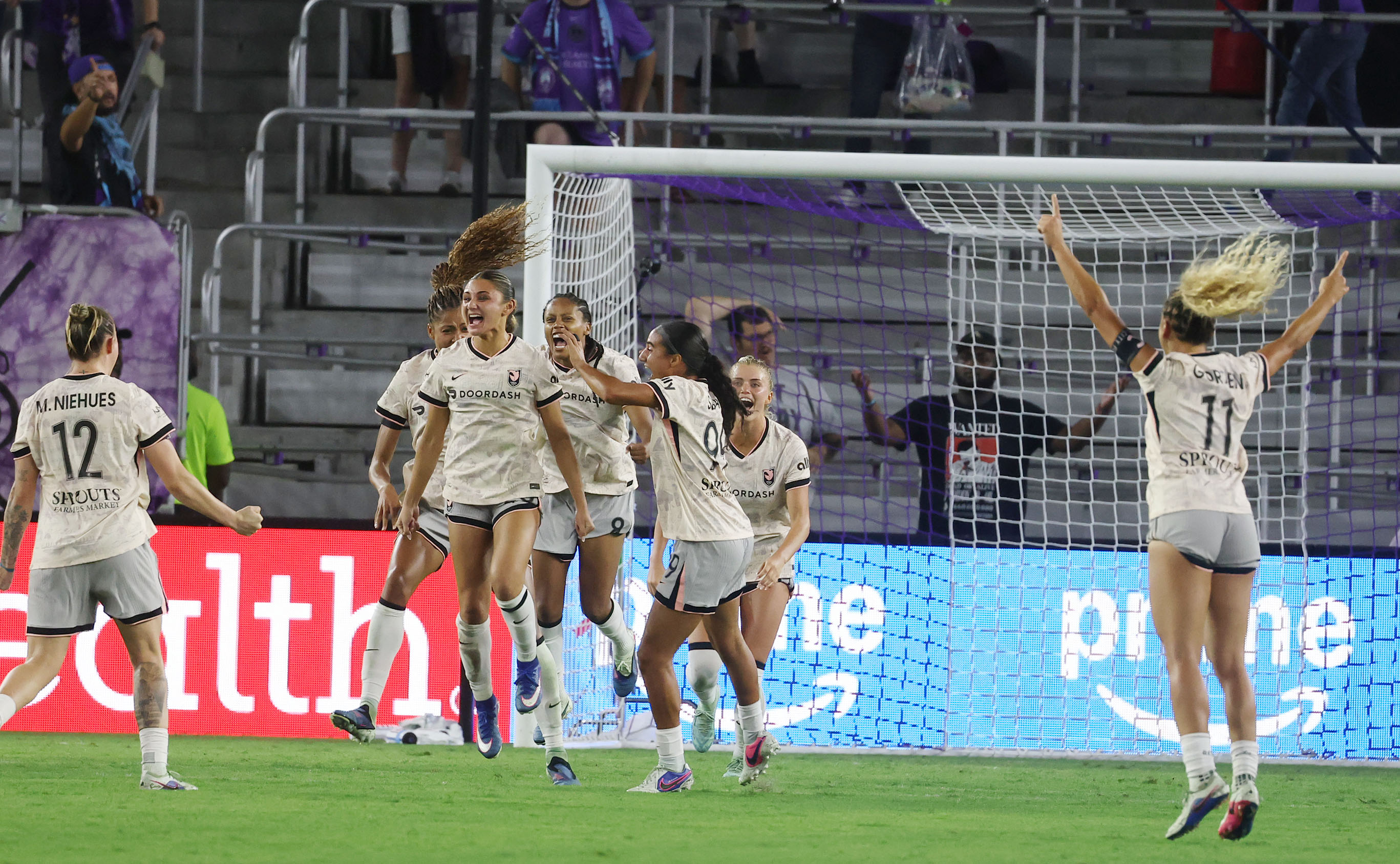 Angel City players celebrate after a goal during the Angel...