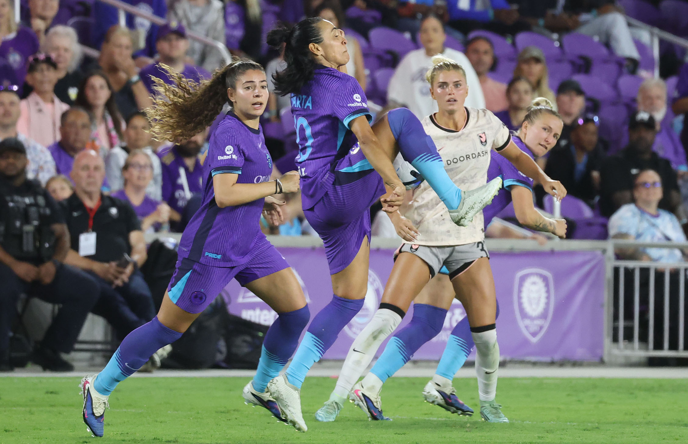 Orlando player Marta (middle) leaps during the Angel City FC...