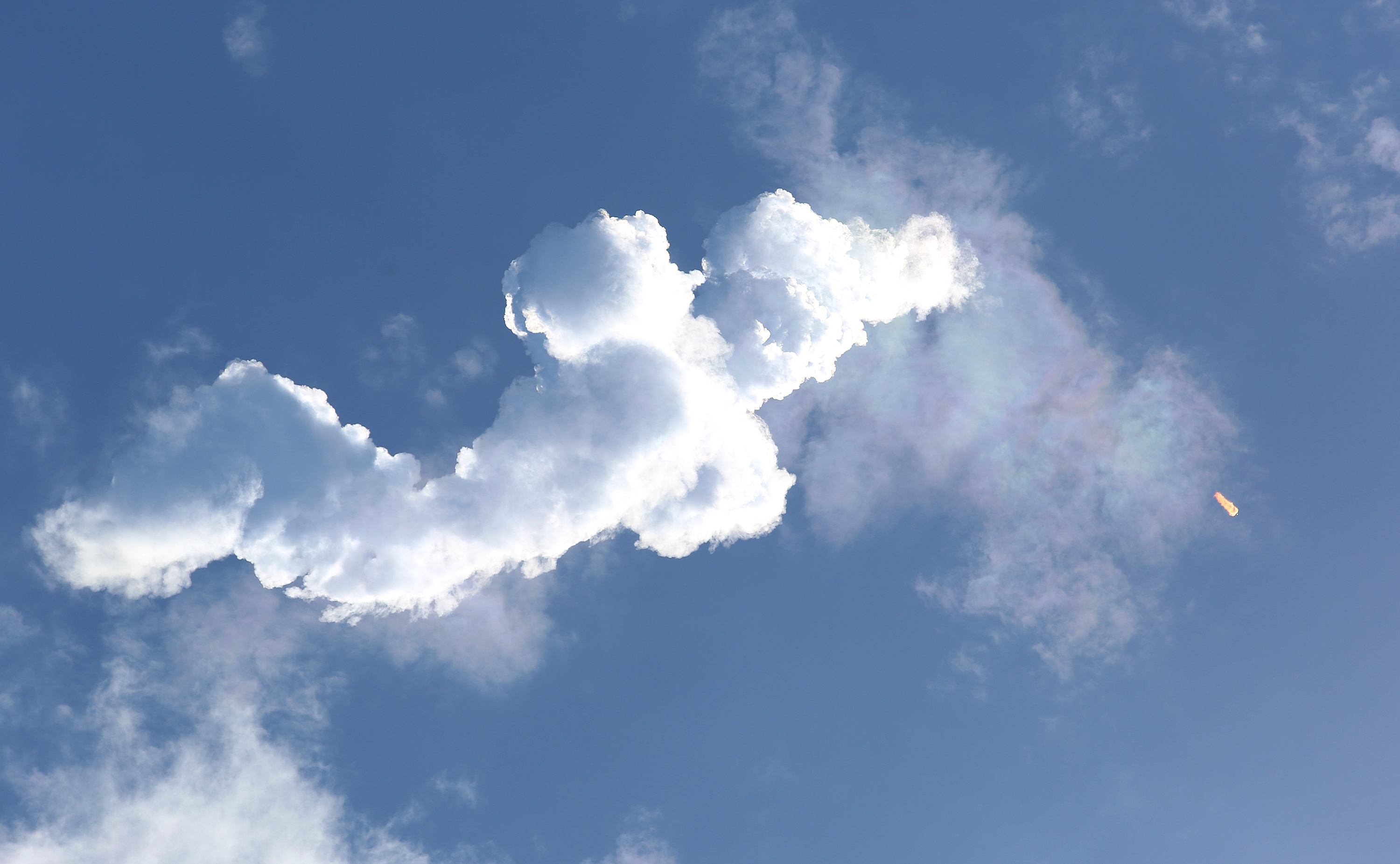 A SpaceX Falcon Heavy rocket launches from Kennedy Space Center's...