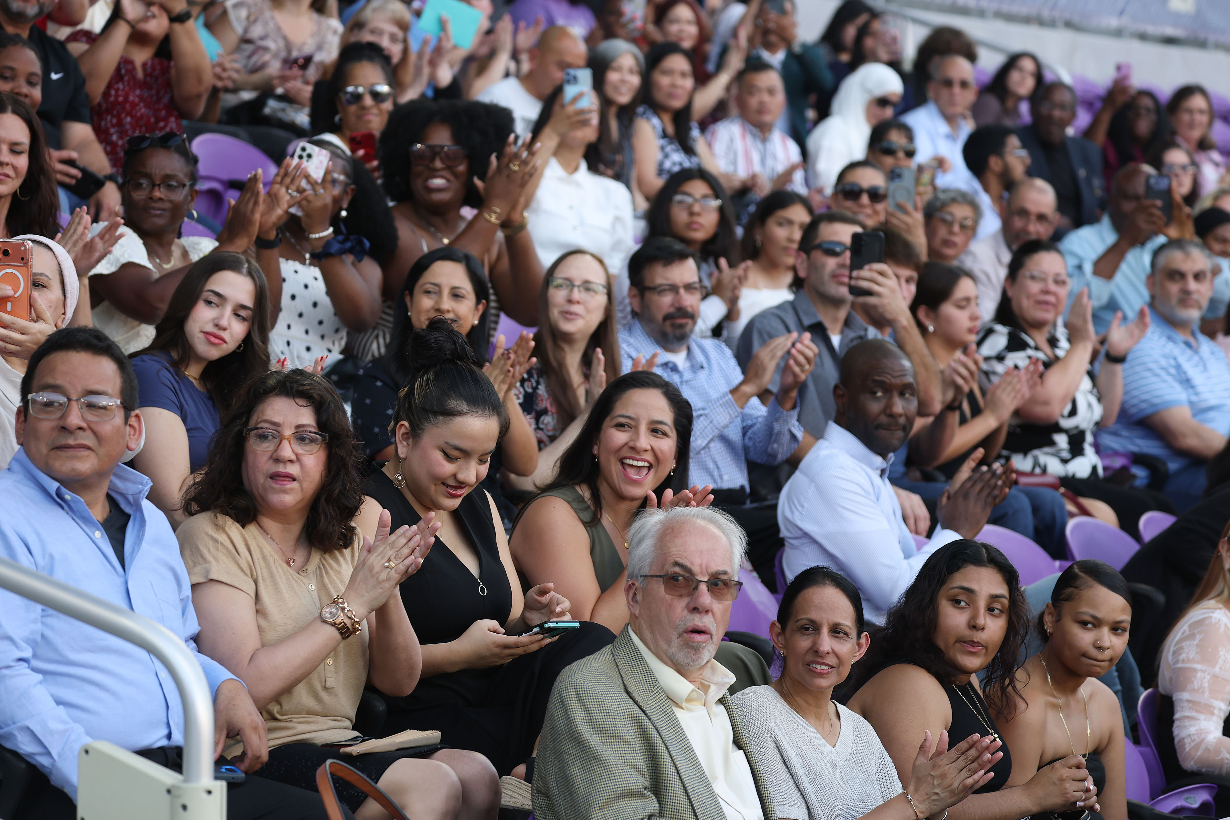 Parents of graduates react with awe and joy as it...