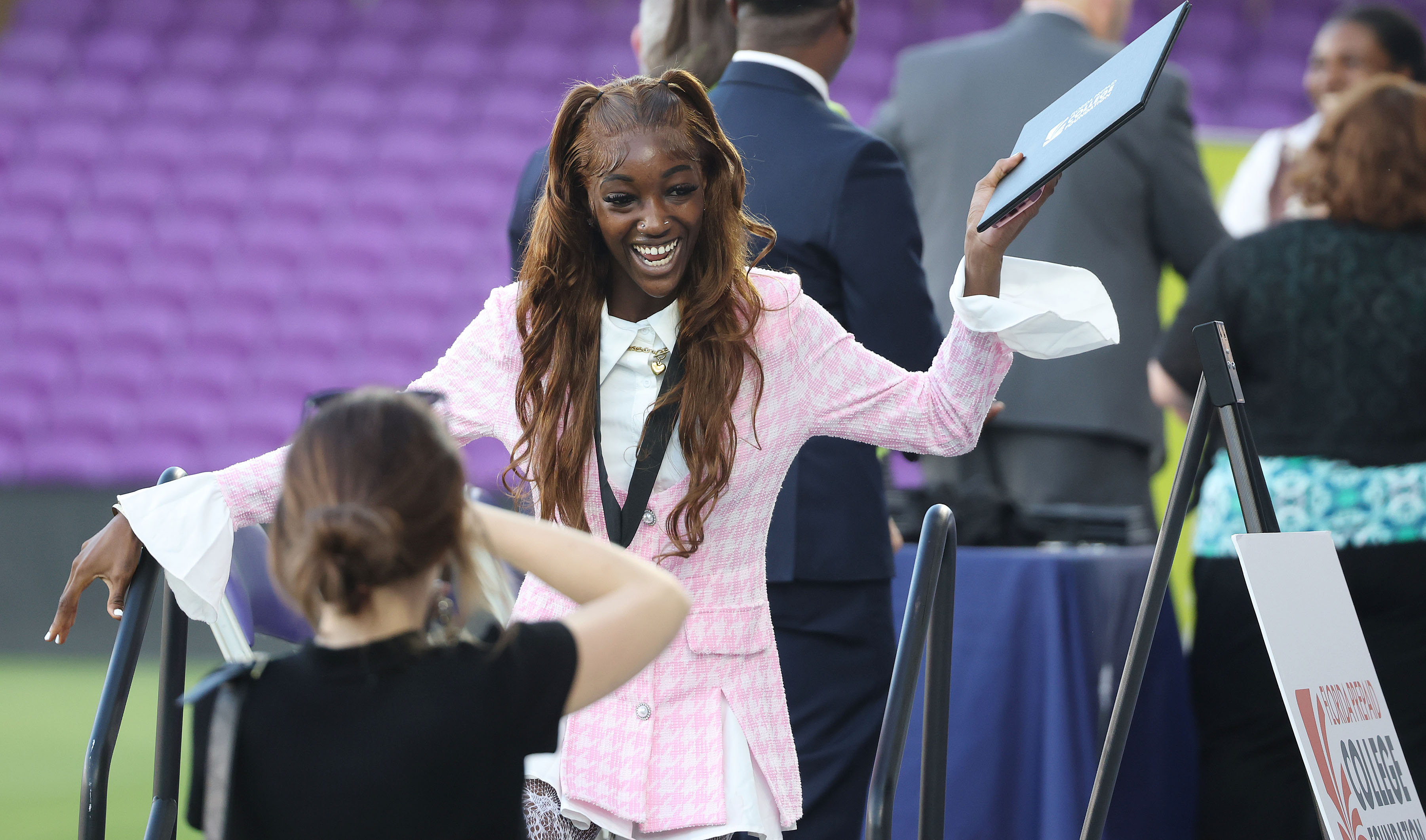 Graduate Avil-Lee McCurvin celebrates during the Take Stock In Children...