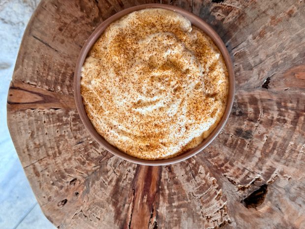 At June, the cabbage dish is butter braised, fired up and topped with a beautiful, airy onion cream. (Photo courtesy Chuan Fu)