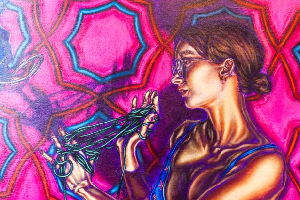 "A wire, a thread" contrasts textiles, barbed wire and mass-produced garnments by Mär Martinez at the Art & History Museums of Maitland on April 22, 2026. (Patrick Connolly/Orlando Sentinel)