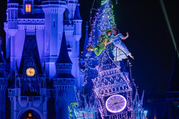 The nighttime parade at Magic Kingdom, 'Disney Starlight: Dream the Night Away,' is now showering viewers with a little extra faith, trust and pixie dust as Peter Pan and Wendy soar to new heights. Visitors may see the two take flight around their parade float during the performance. (Steven Diaz/Walt Disney Co.)