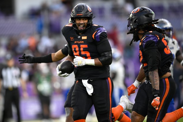 Orlando Storm defensive end Amani Bledsoe (95) , who was acquired from Birmingham in a trade last Saturday, celebrates after intercepting a pass during a UFL football game against the St. Louis Battlehawks, Saturday, April 25, 2026, in Orlando, Fla. (Phelan M. Ebenhack for the Orlando Sentinel)