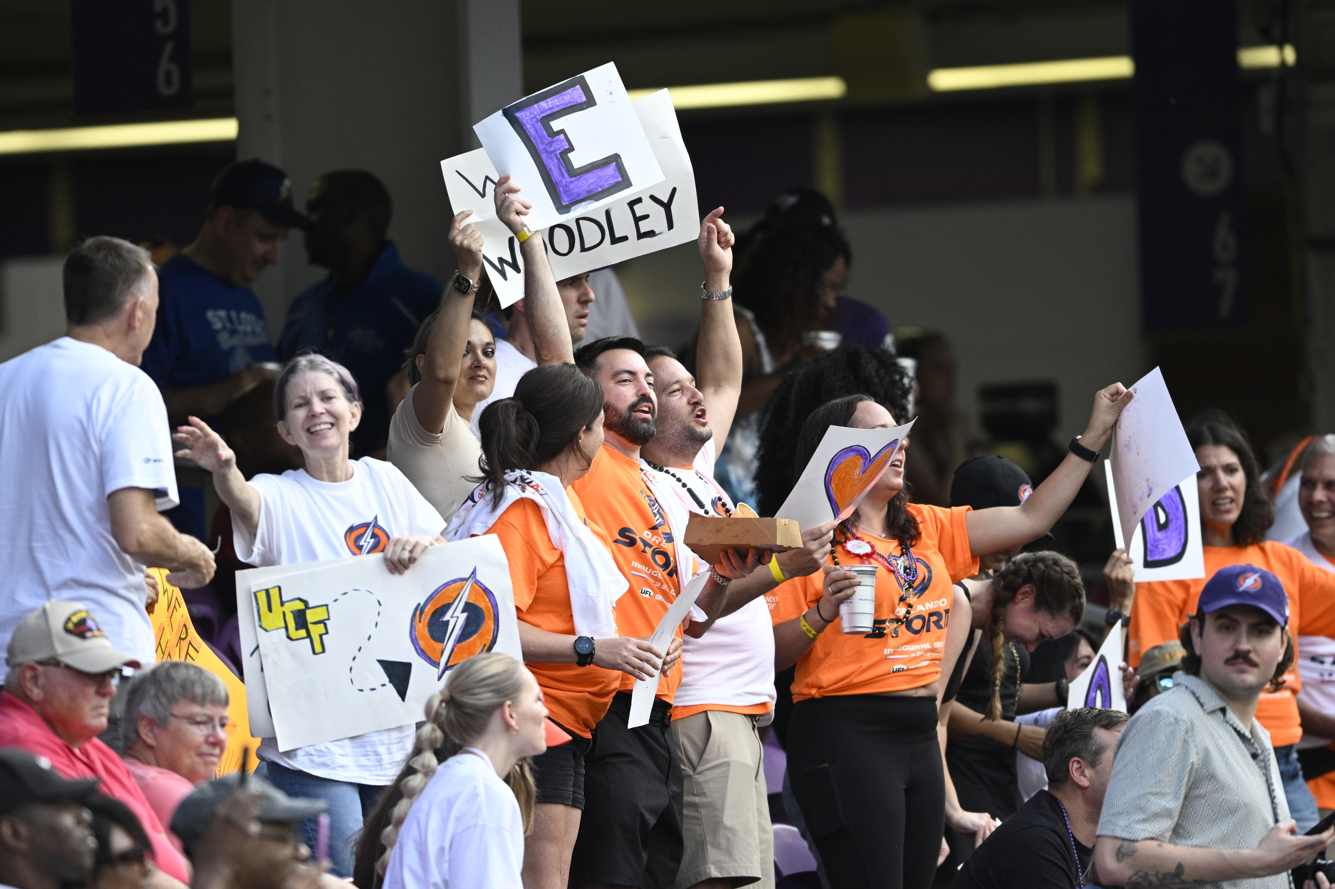 Fans cheer in the stands before a UFL football game...