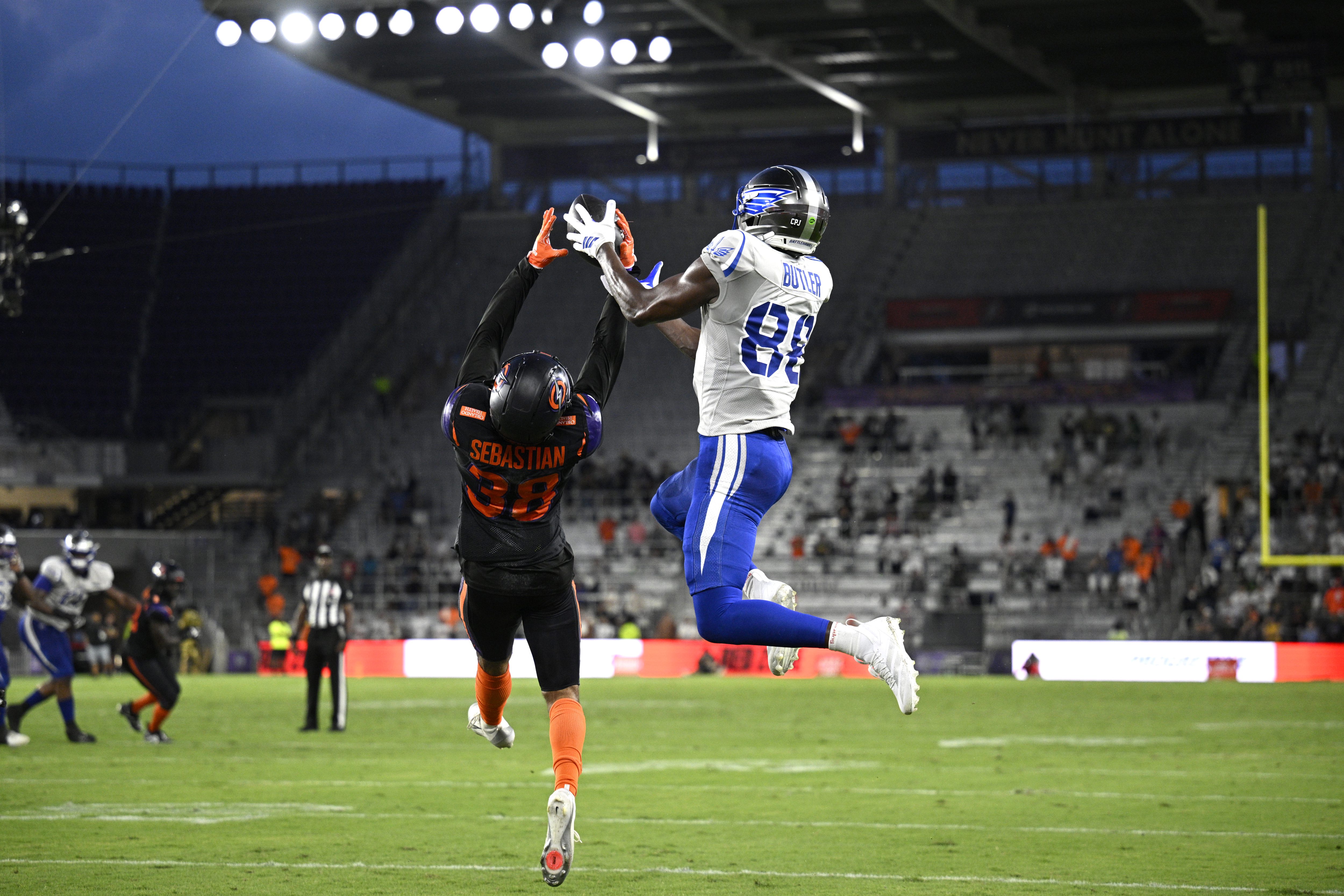 Orlando Storm cornerback Brandon Sebastian, left, canât hold onto a...