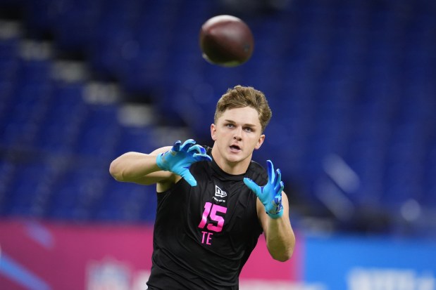 FILE - Houston tight end Tanner Koziol (15) runs a drill at the NFL football scouting combine in Indianapolis, Feb. 27, 2026. (AP Photo/Michael Conroy, File)