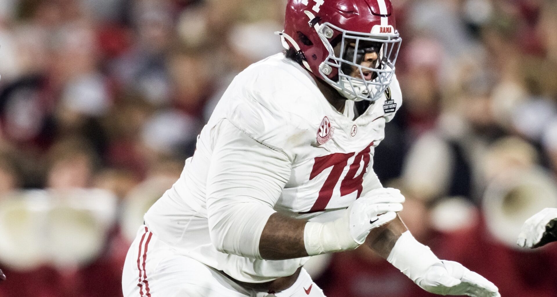 Dec 19, 2025; Norman, OK, USA; Alabama Crimson Tide offensive lineman Kadyn Proctor (74) against the Oklahoma Sooners during the CFP National Playoff First Round at Gaylord Family Oklahoma Memorial Stadium.
