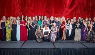 Group of 2026 Women Who Win honorees on stage at The Vinoy Resort & Golf Club