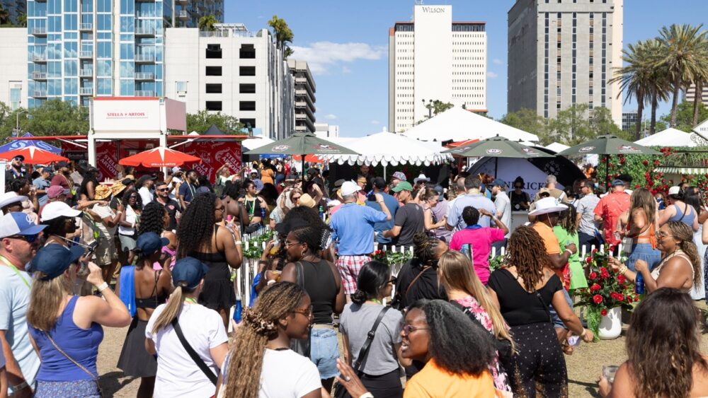 Crowds gather at Curtis Hixon Waterfront Park during the Grand Tasting at the Tampa Bay Wine & Food Festival.