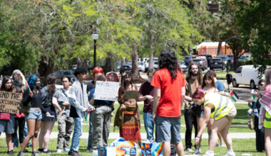 Students in Tallahassee, Florida protest at pro Israel fair.