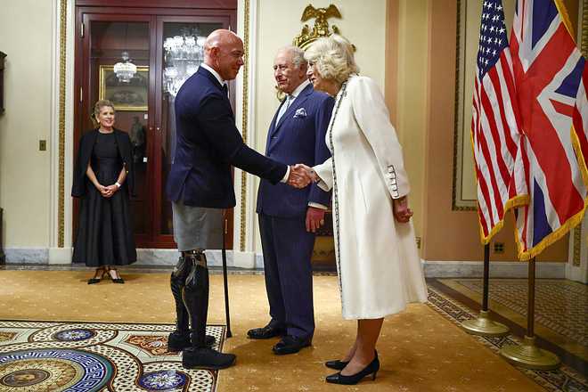 King Charles III And Queen Camilla State Visit Continues In Washington DC WASHINGTON, DC - APRIL 28: Britain's King Charles III and Queen Camilla are greeted by US Representative Brian Mast, Republican from Florida, before the King's address to a Joint Meeting of Congress in the House Chamber at the U.S. Capitol during day two of the State Visit of King Charles III and Queen Camilla to the United States of America on April 28, 2026 in Washington, DC. In his first visit to the U.S. as the British monarch, King Charles III is addressing Congress as part of a multi-day trip to the nation's capital, New York City, and Virginia celebrating the United States of America's 250th anniversary of its independence. (Photo by Henry Nicholls - Pool via Samir Hussein/WireImage)