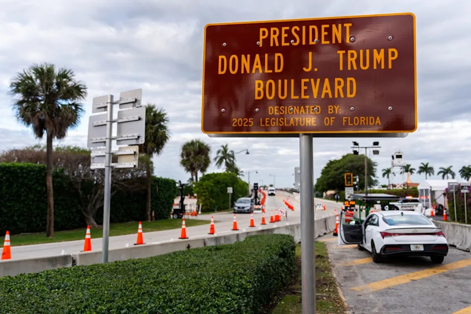 A road sign marks the dedicated portion of Southern Boulevard, which the Town of Palm Beach Council recently voted to rename, “President Donald J. Trump Boulevard,” Saturday, Jan. 17, 2026, outside President Donald Trump’s Mar-a-Lago club in Palm Beach, Fla. (AP Photo/Julia Demaree Nikhinson)
