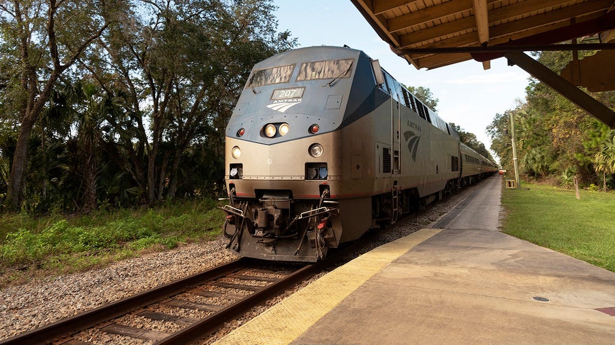 An Amtrak passenger train arriving at DeLand Station in Florida