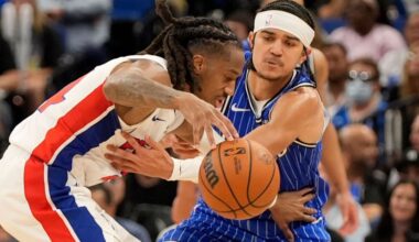 Magic guard Anthony Black (right) attempts to steal the ball from Pistons guard Daniss Jenkins on Monday, April 6, 2026, in Orlando, Fla. (AP Photo/John Raoux)