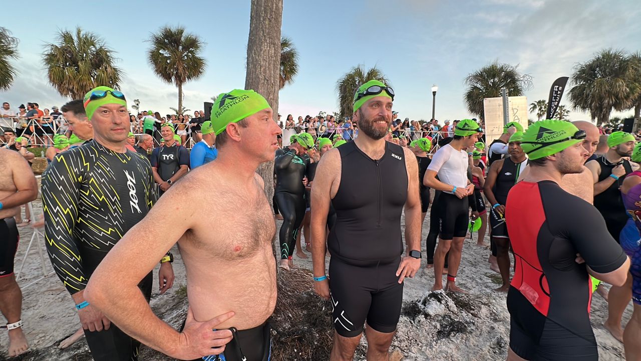 Antony Mascovich (right) participated in the St. Anthony's Triathlon along with 3,000 other athletes. (Spectrum News/Randy Levine)