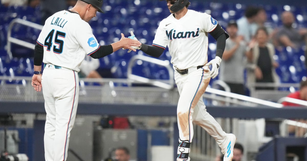 Miami Marlins end Cincinnati Reds' 5-game winning streak, beating them 7-4