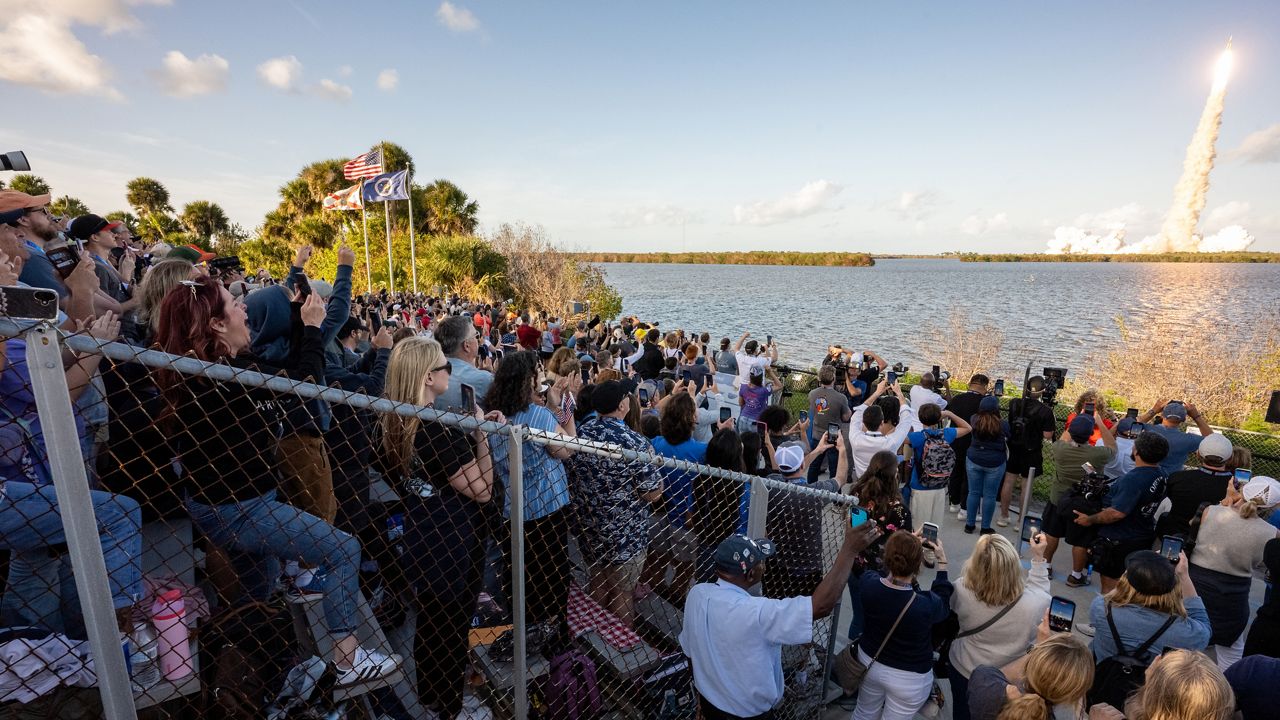 Guests at the Banana Creek viewing site watch the launch of the Artemis II mission's Space Launch System rocket and Orion spacecraft, Wednesday, April 1, 2026, at NASA’s Kennedy Space Center in Florida. (NASA/Keegan Barber)