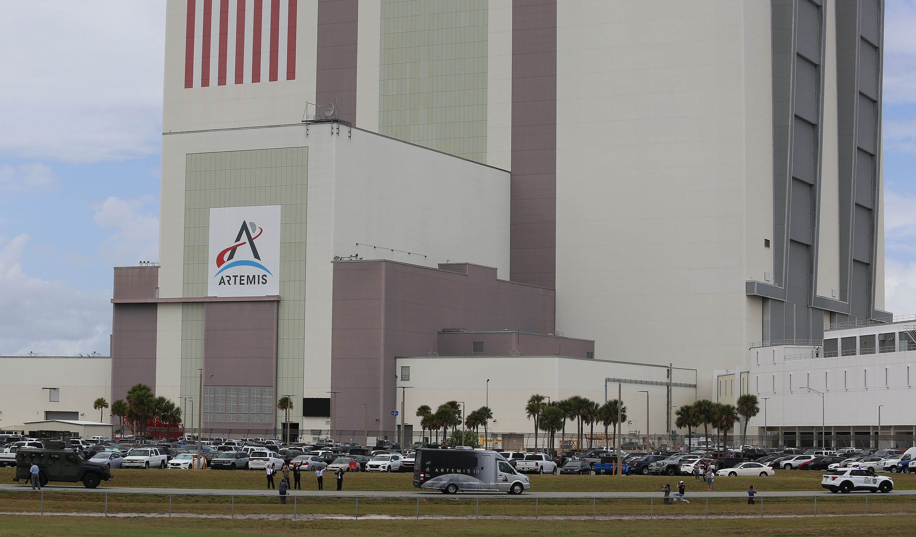 The Artemis II astronauts ride in the Astrovan on their...