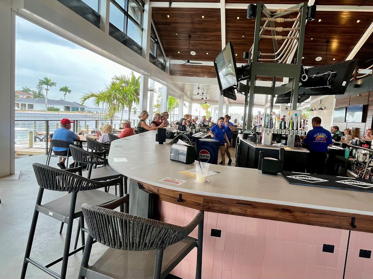The Helm Bar is situated in the middle of Slipaway Food Truck Park & Marina in Cape Coral.