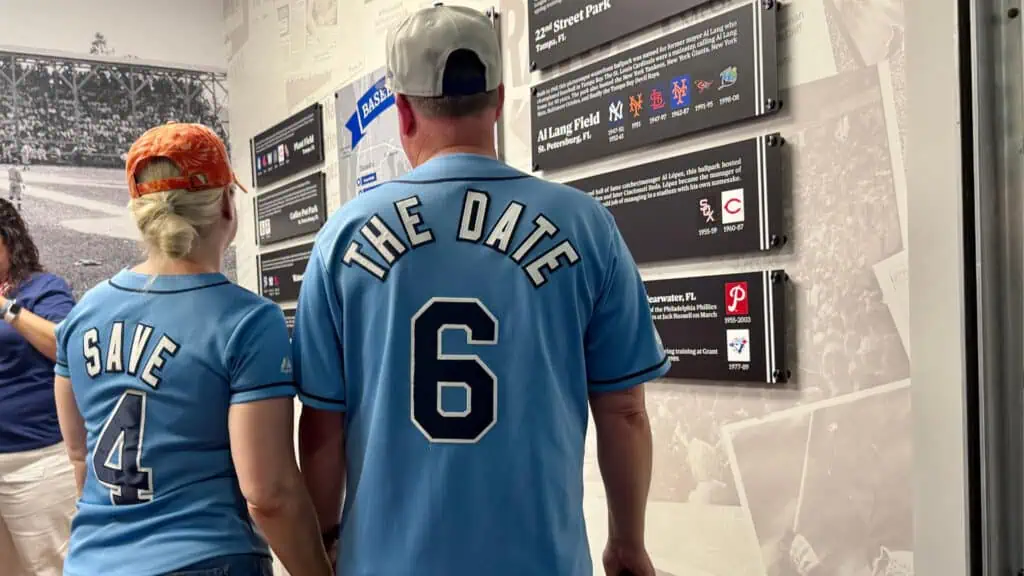 A couple at a baseball stadium