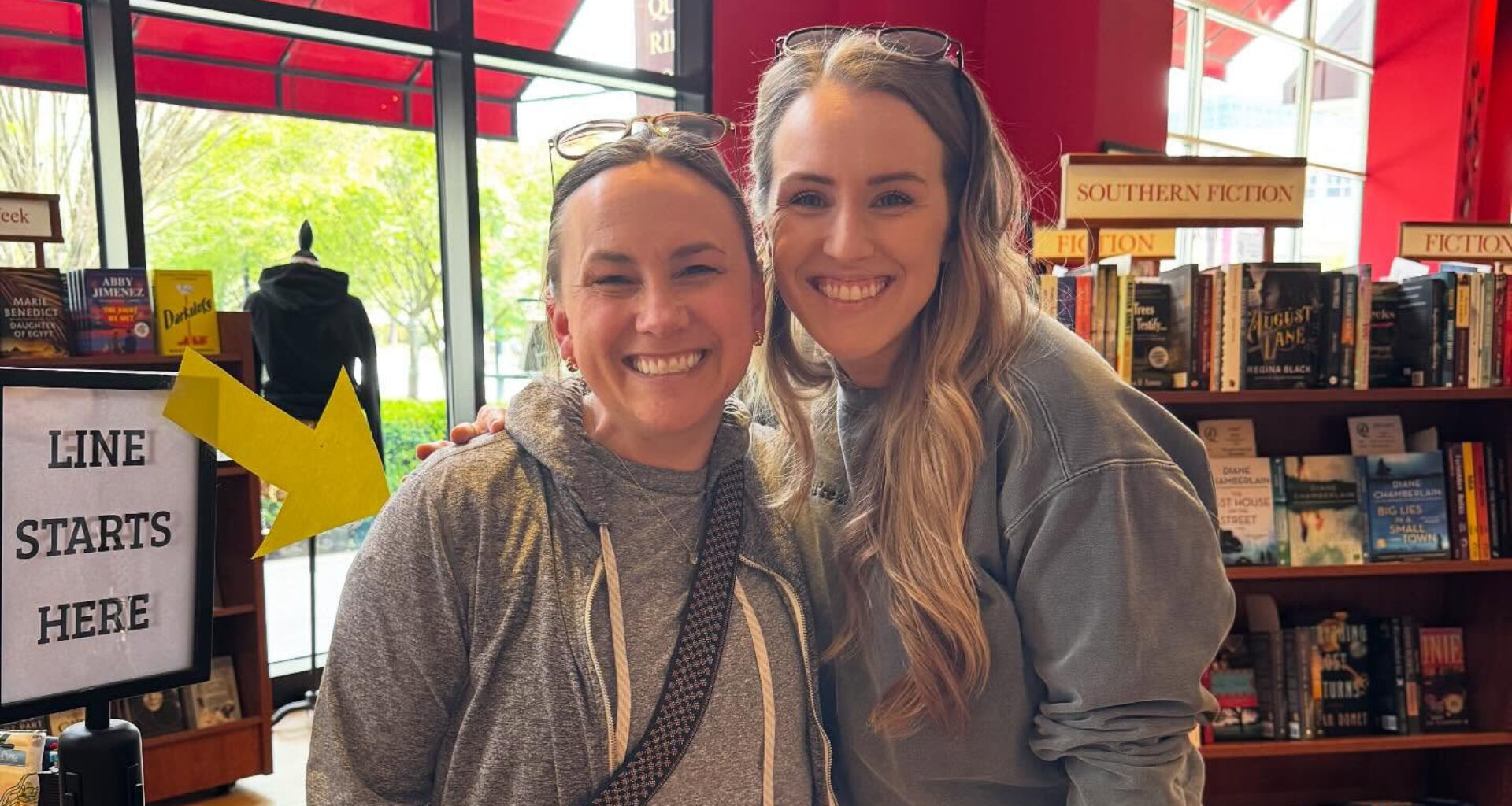 An author and fan at a bookstore