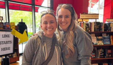 An author and fan at a bookstore