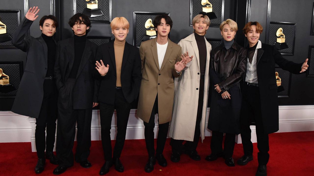 FILE - In this Jan. 26, 2020 file photo, K-pop band BTS arrives at the 62nd annual Grammy Awards in Los Angeles. (Photo by Jordan Strauss/Invision/AP, File)
