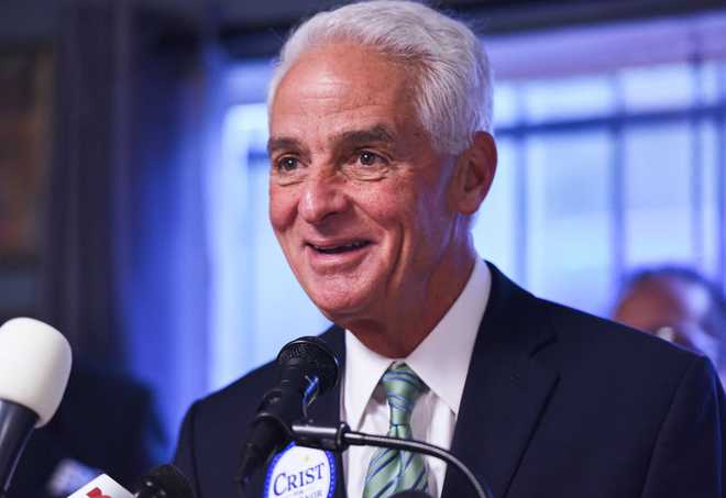 Representative Charlie Crist, the Democratic gubernatorial APOPKA, FLORIDA, UNITED STATES - 2022/11/03: Representative Charlie Crist, the Democratic gubernatorial candidate for Florida, addresses supporters at a campaign stop in Apopka as part of his Choose Freedom bus tour. Crist faces Republican Governor Ron DeSantis in the November 8 election. (Photo by Paul Hennessy/SOPA Images/LightRocket via Getty Images)