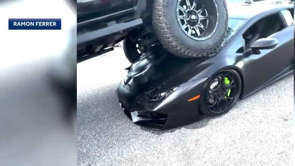 Pickup truck crushes Lamborghini with driver inside in Lake Nona parking lot
