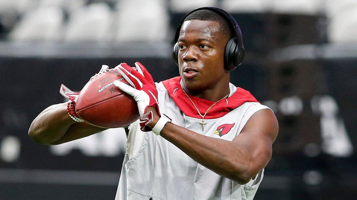 Cornerback Chris Jones warming up on the field at State Farm Stadium in Glendale, Arizona