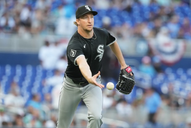 Chicago White Sox starting pitcher Erick Fedde (47) throws to first base for an out during the second inning of a baseball game against the Miami Marlins Tuesday, March 31, 2026, in Miami. (AP Photo/Marta Lavandier)