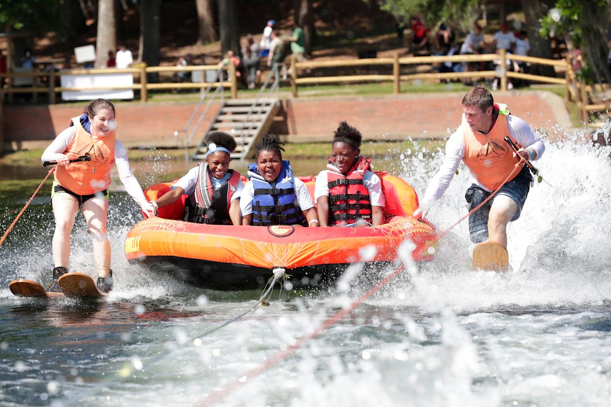 De'Ayja Arnett, second from left, Adrian Gordon, and Destyne Arnett, tube on the water during SportsAbility, at Maclay Garden State Park Saturday, April 13, 2019. The 2026 SportsAbility adventure day is April 18 at Maclay Gardens.