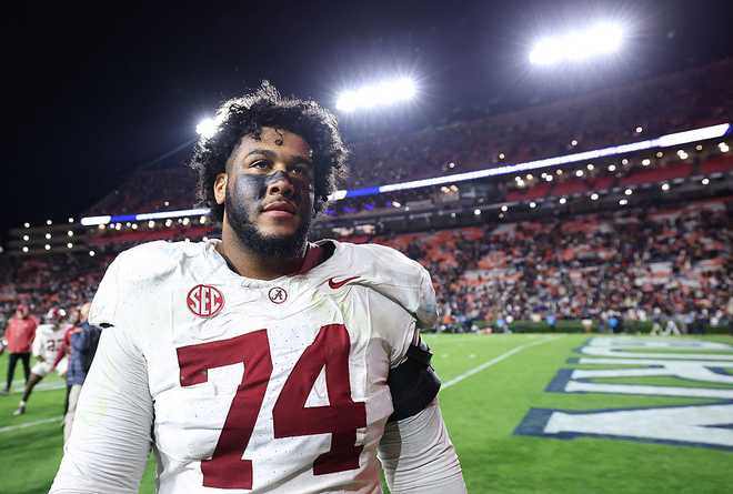 Alabama v Auburn AUBURN, ALABAMA - NOVEMBER 29: Kadyn Proctor #74 of the Alabama Crimson Tide reacts after their 27-20 win over the Auburn Tigers at Jordan-Hare Stadium on November 29, 2025 in Auburn, Alabama. (Photo by Kevin C. Cox/Getty Images)