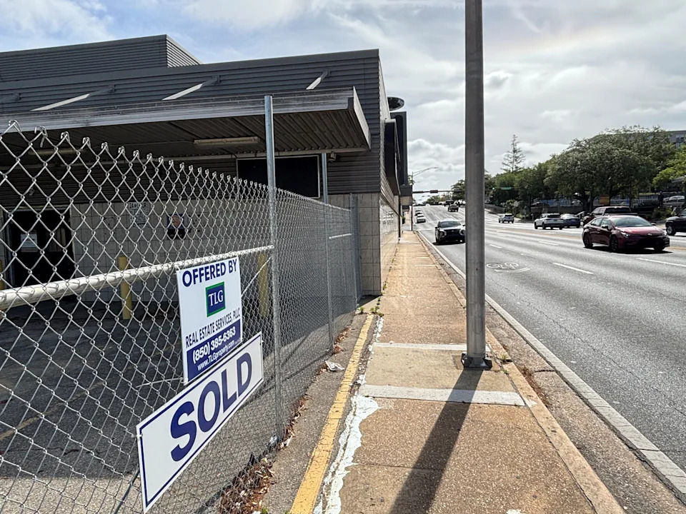 A "sold" sign was placed on the former Greyhound bus station after Drury Hotels Company, LLC, purchased two parcels totaling 2 acres for $12 million, according to property records.