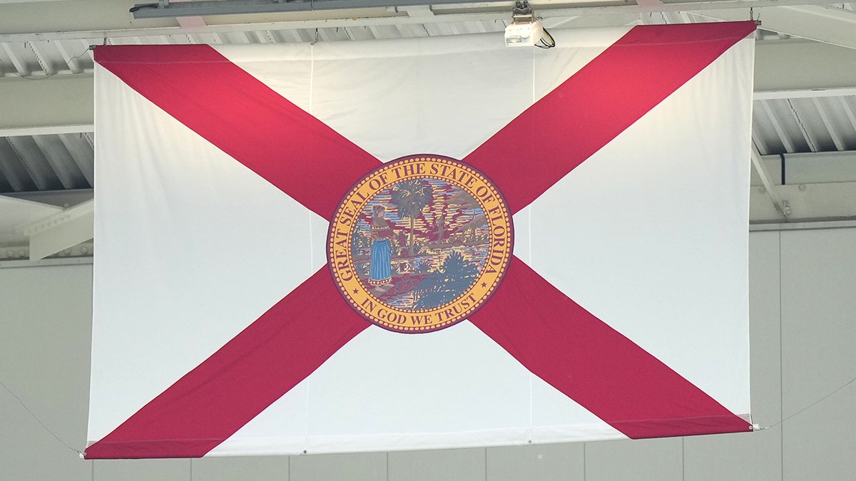 Florida State flag flying at Hard Rock Stadium during football game