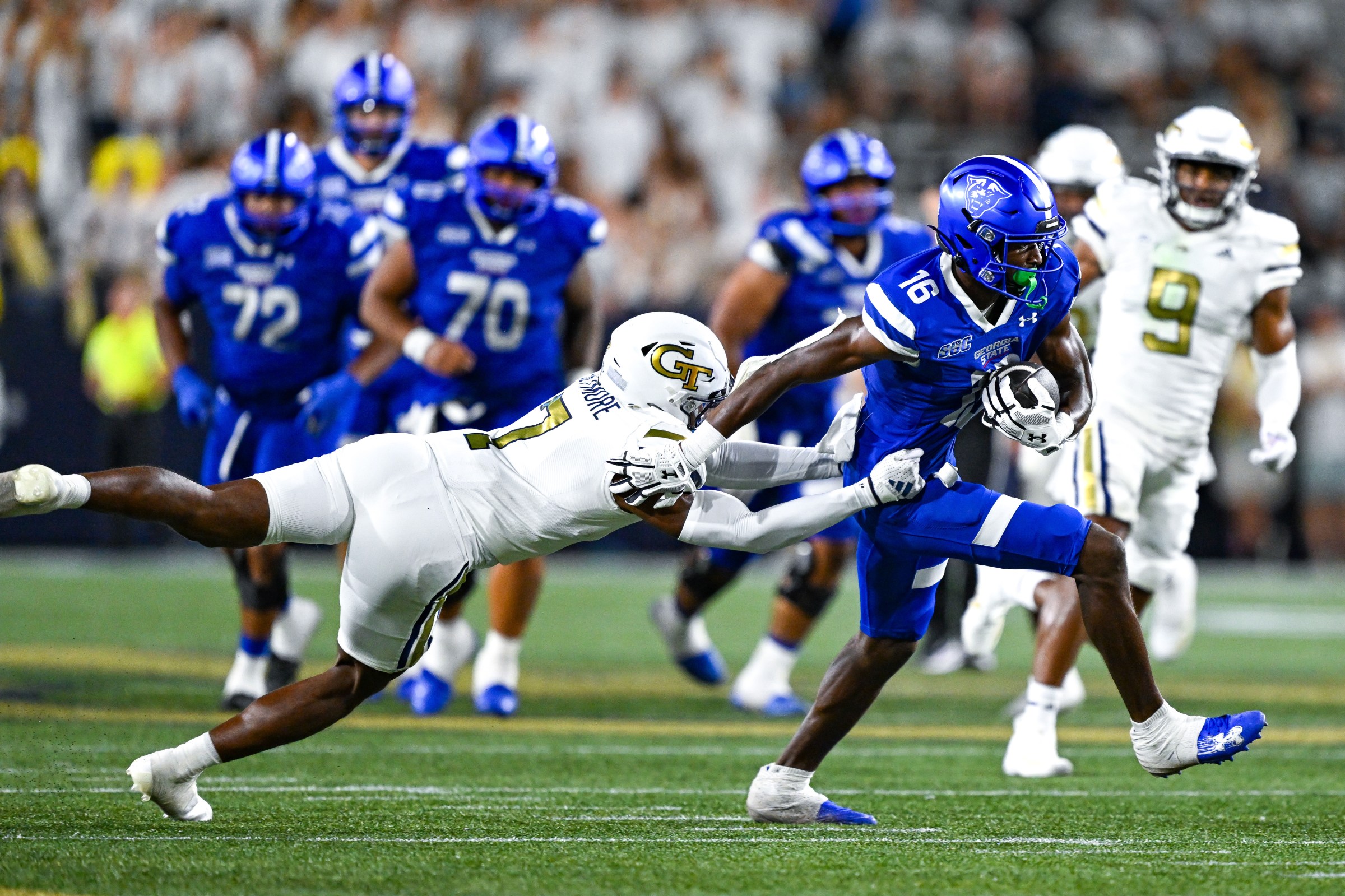 ATLANTA, GA AUGUST 31: Georgia State wide receiver Ted Hurst (16) runs by Georgia Tech defensive back Taye Seymore (7) during the college football game between the Georgia State Panthers and the Georgia Tech Yellow Jackets on August 31st, 2024 at Bobby Dodd Stadium in Atlanta, GA. (Photo by Rich von Biberstein/Icon Sportswire via Getty Images)