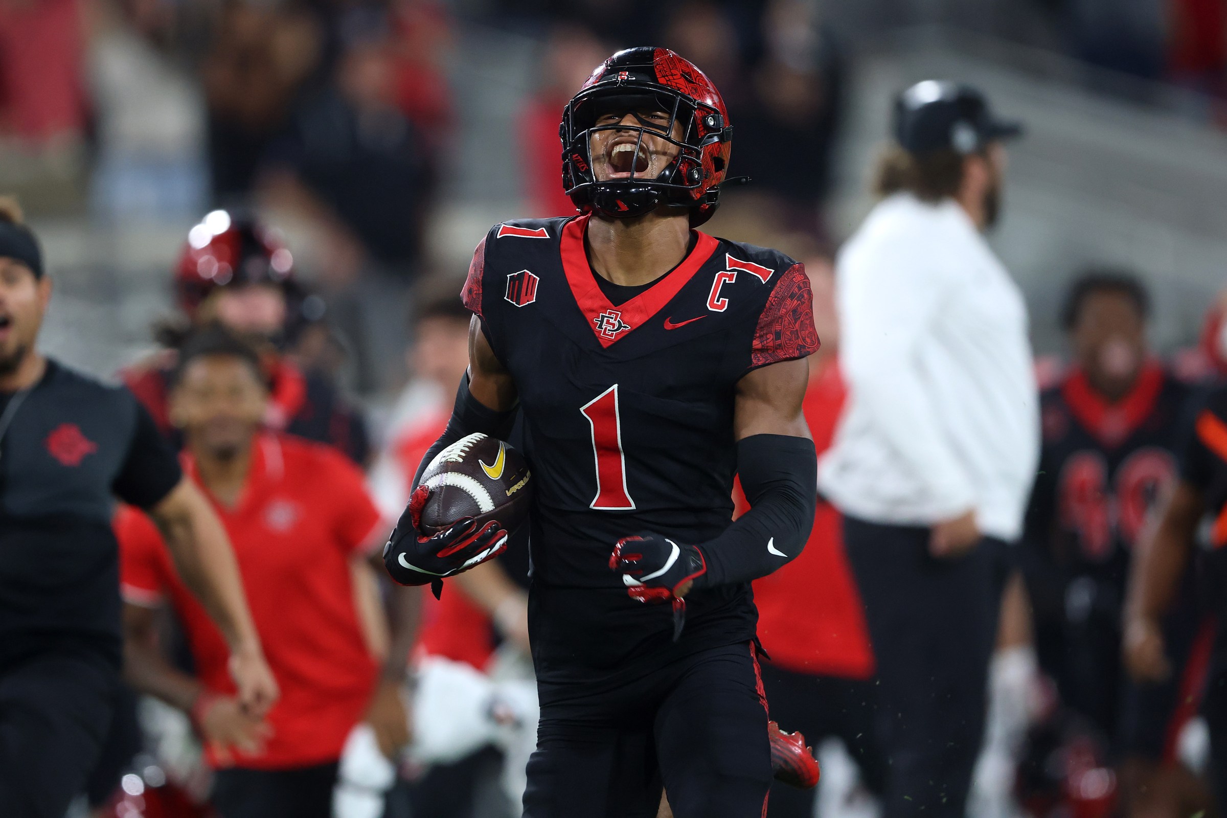 SAN DIEGO, CALIFORNIA - SEPTEMBER 20: Chris Johnson #1 of the San Diego State Aztecs reacts as he returns an interception for a touchdown during the second half of a game against the California Golden Bears at Snapdragon Stadium on September 20, 2025 in San Diego, California. (Photo by Sean M. Haffey/Getty Images)