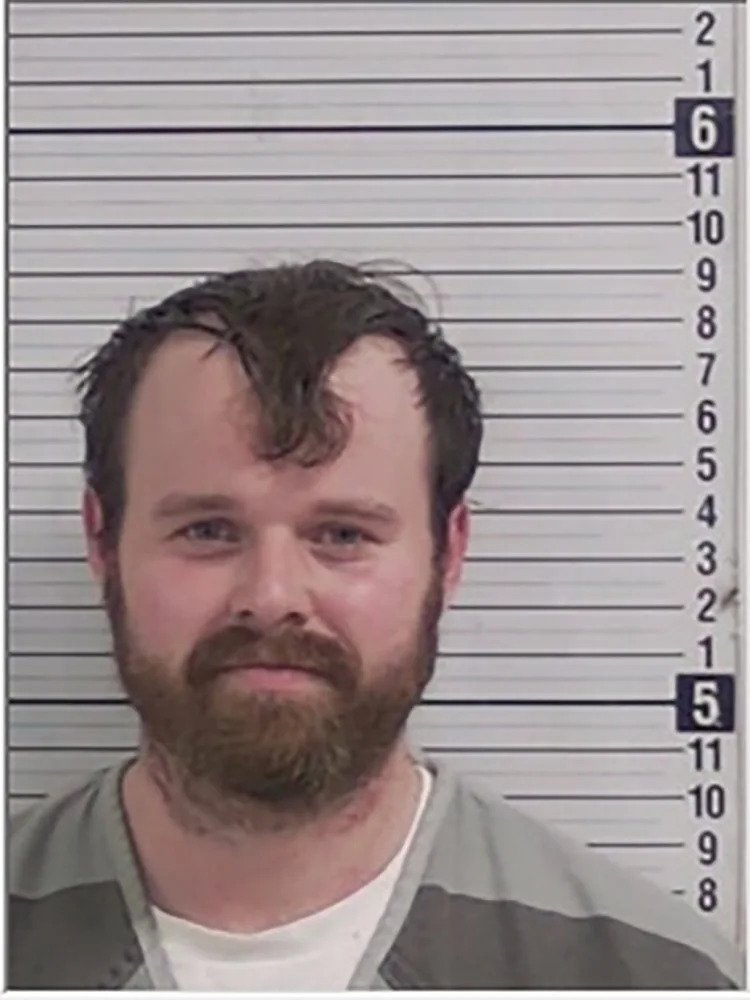 Joseph Duggar in a police booking photo.