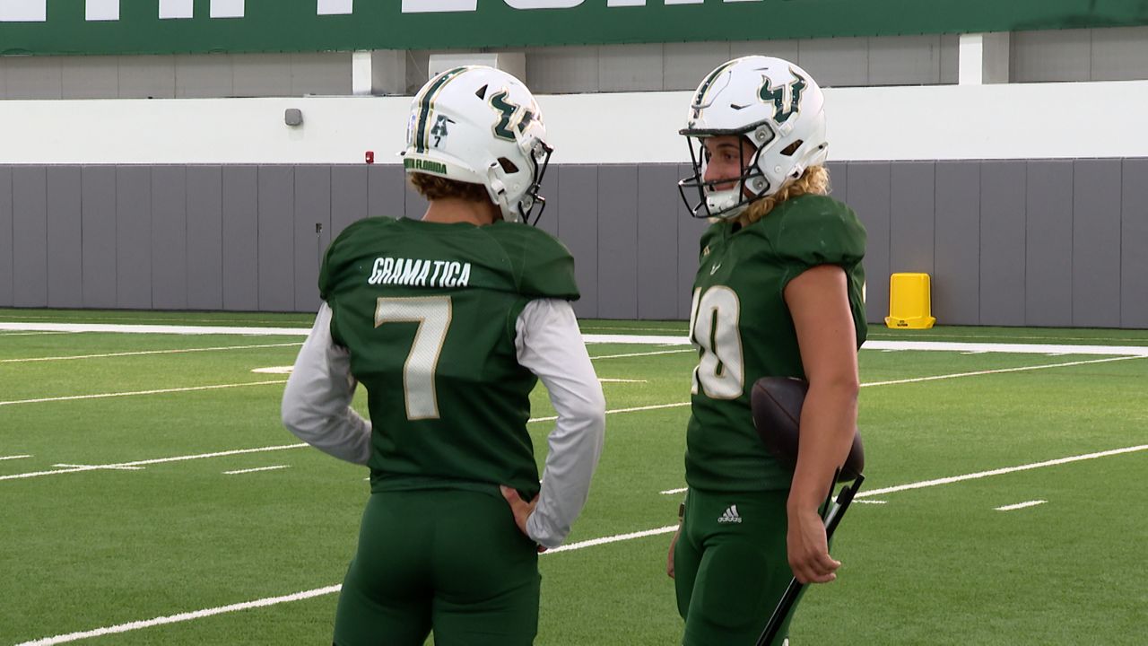 Nico and Gaston Gramatica talk during USF football practice. (Michael Epps - Spectrum Sports 360)