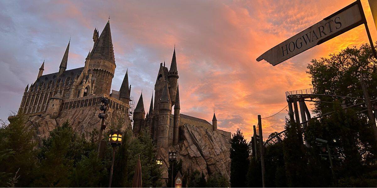 Hogwarts Castle at Universal's Islands of Adventure in the Wizarding World of Harry Potter at Universal Orlando Resort at sunset
