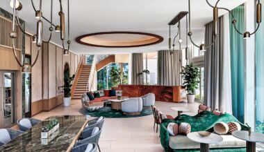 suite with dining table and staircase and lounge area